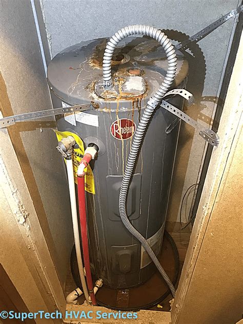 hot water heater leaking from top anode|Water Heater Leaking From the Top Fixes 